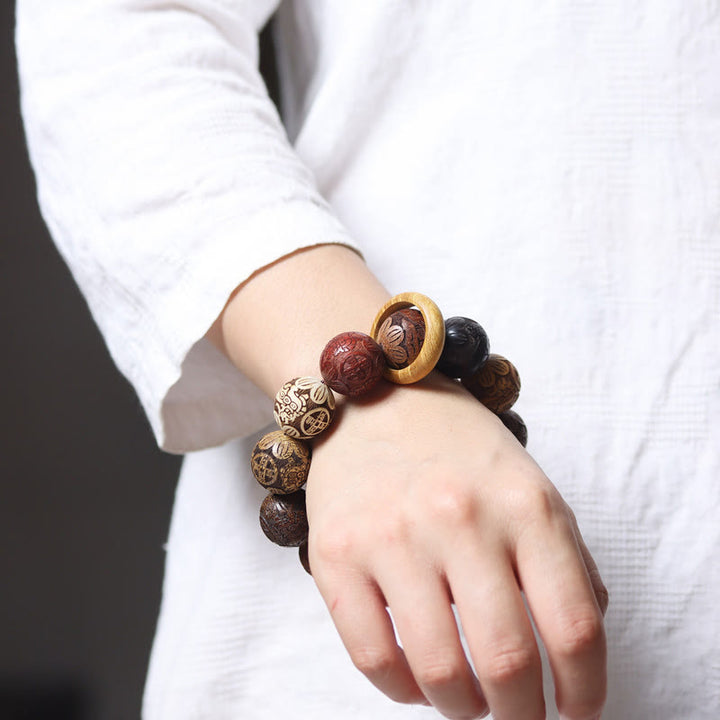 Pulsera curativa con Buddha Stones talladas en sándalo, símbolo del zodíaco chino, dragón auspicioso, fénix y Fu.