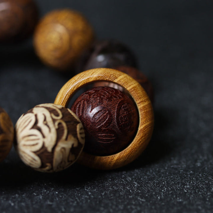 Pulsera curativa con Buddha Stones talladas en sándalo, símbolo del zodíaco chino, dragón auspicioso, fénix y Fu.