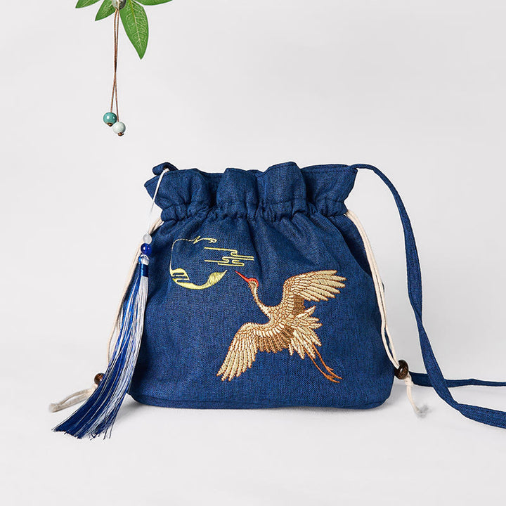 Bolso bandolera de lino y algodón con grulla azul marino bordada con Buddha Stones