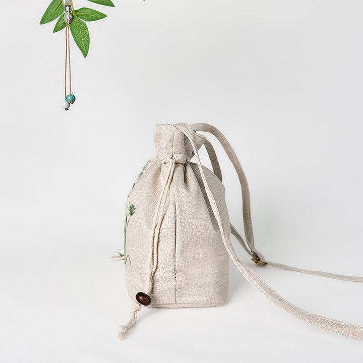Bolso bandolera de lino y algodón con orquídea beige bordada con Buddha Stones