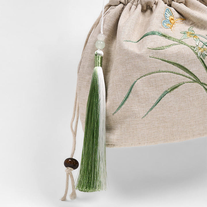 Bolso bandolera de lino y algodón con orquídea beige bordada con Buddha Stones