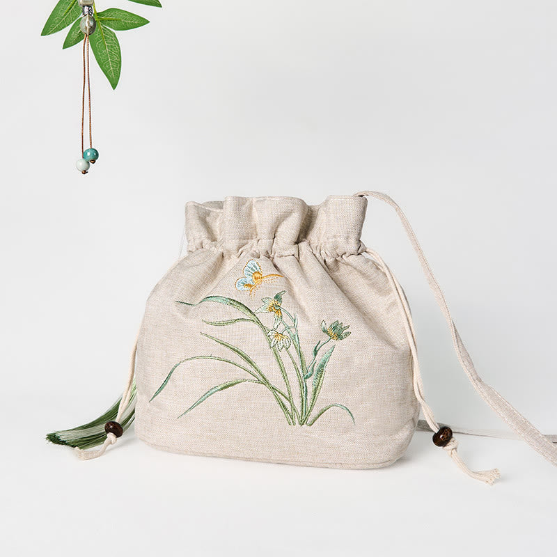 Bolso bandolera de lino y algodón con orquídea beige bordada con Buddha Stones