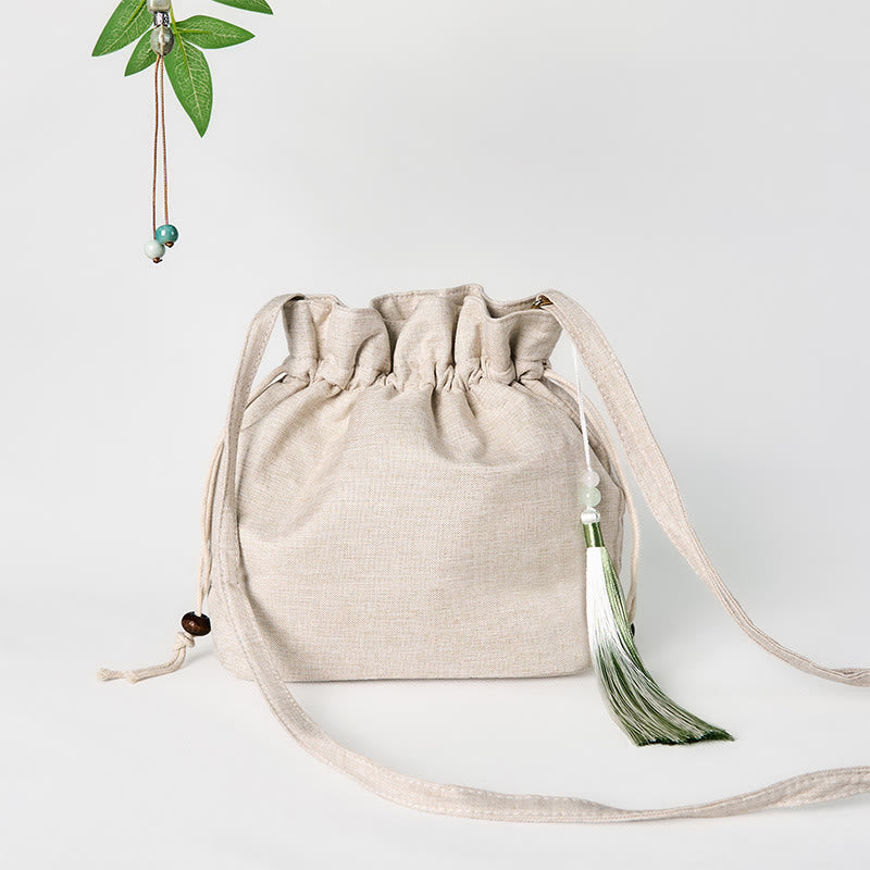 Bolso bandolera de lino y algodón con orquídea beige bordada con Buddha Stones