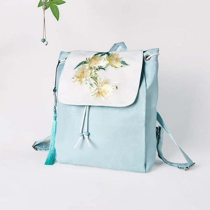 Mochila de lona de gran capacidad con bordado de epifilo azul, hecha a mano con Buddha Stones