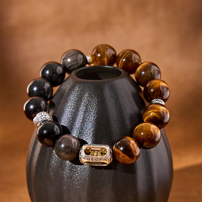 Pulsera protectora Vajra de obsidiana y ojo de tigre con brillo plateado natural de Buddha Stones
