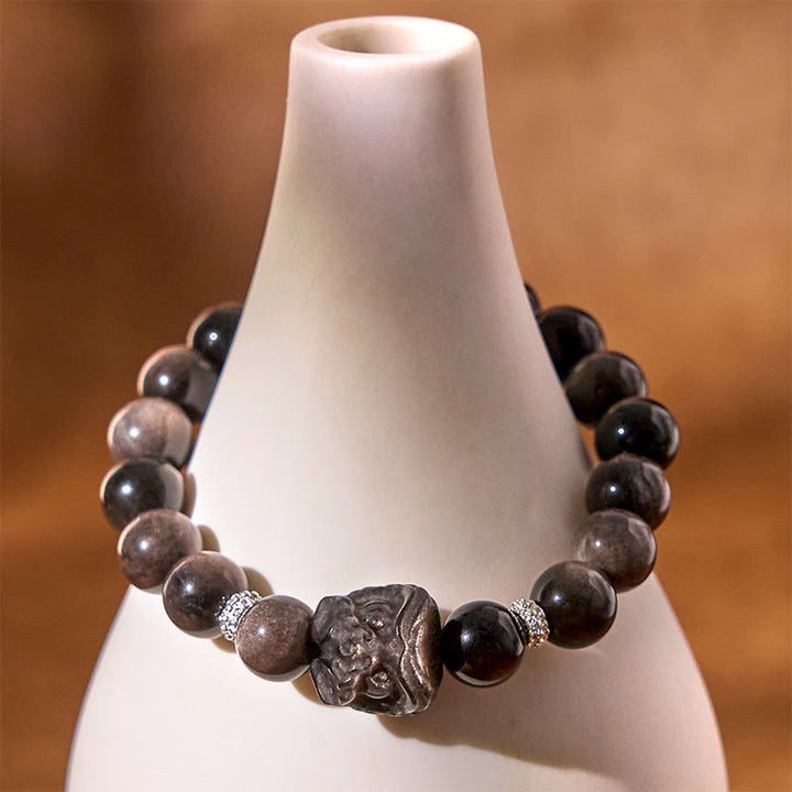 Pulsera protectora de obsidiana con brillo de plata natural y Buddha Stones para danza del león