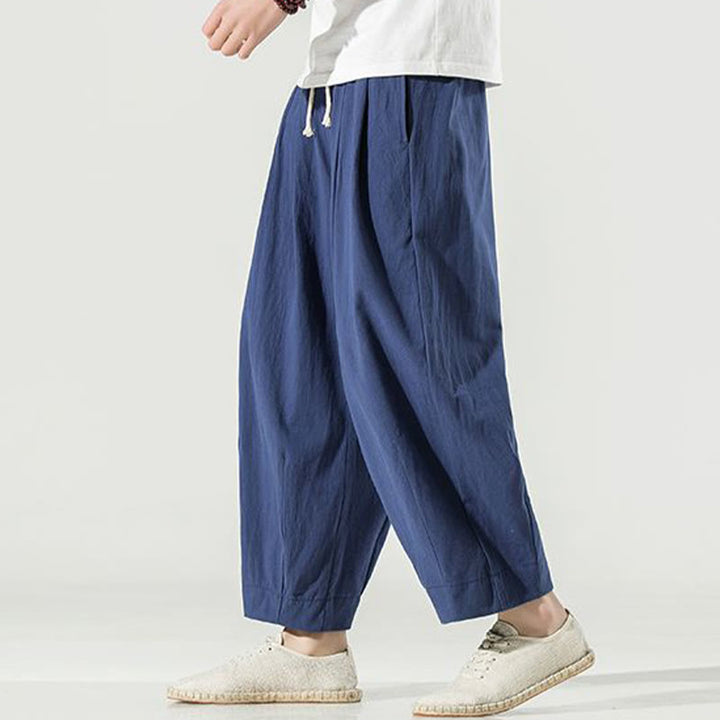 Pantalones harén hasta el tobillo para hombre con bolsillos y diseño de Buddha Stones en color liso - image 2