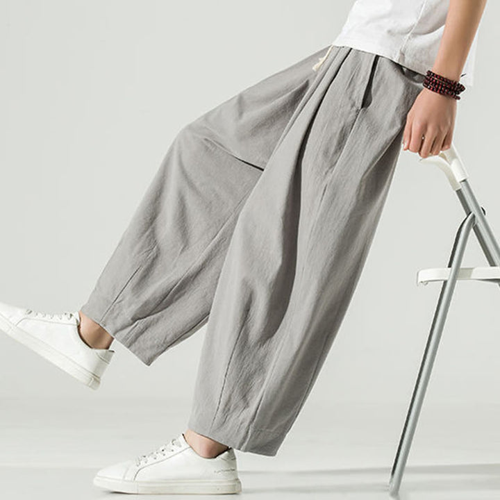 Pantalones harén hasta el tobillo para hombre con bolsillos y diseño de Buddha Stones en color liso - image 13