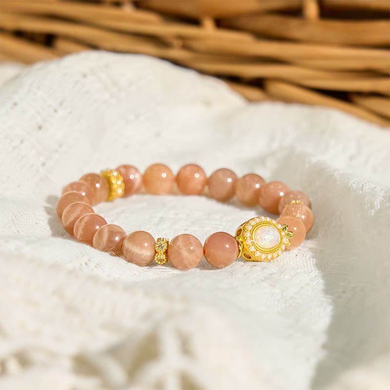 Pulsera relajante ajustable de piedra lunar melocotón natural de Buddha Stones