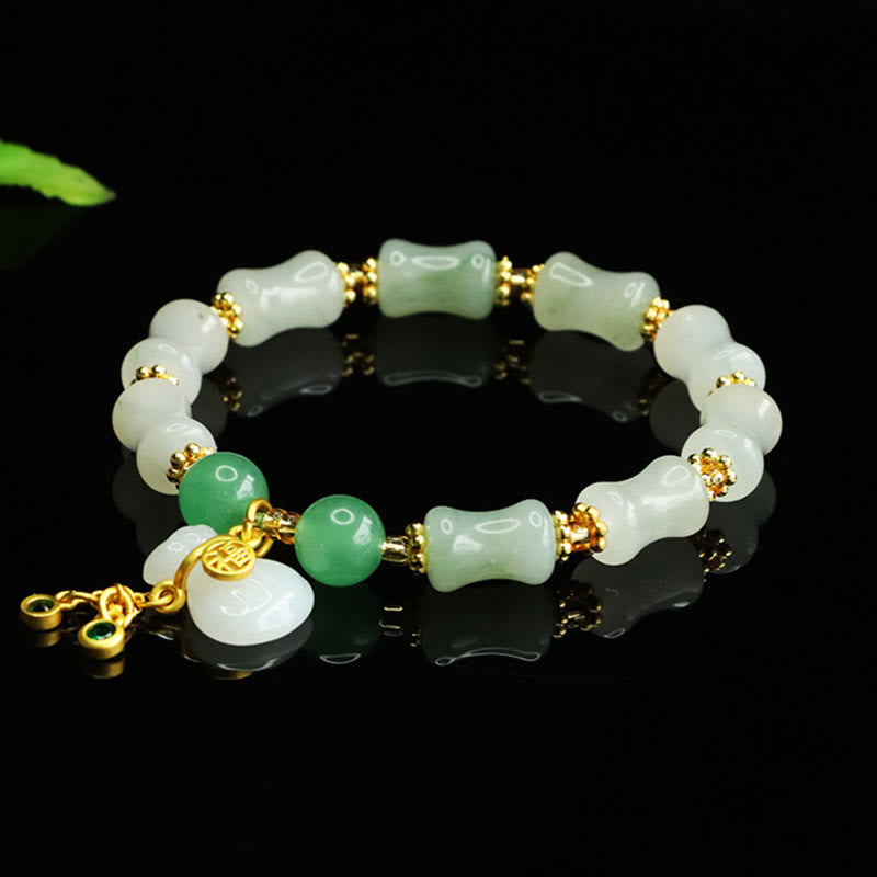 Pulsera de la prosperidad con diseño de bolsa de dinero y jade Tianshan natural de Buddha Stones - image 8