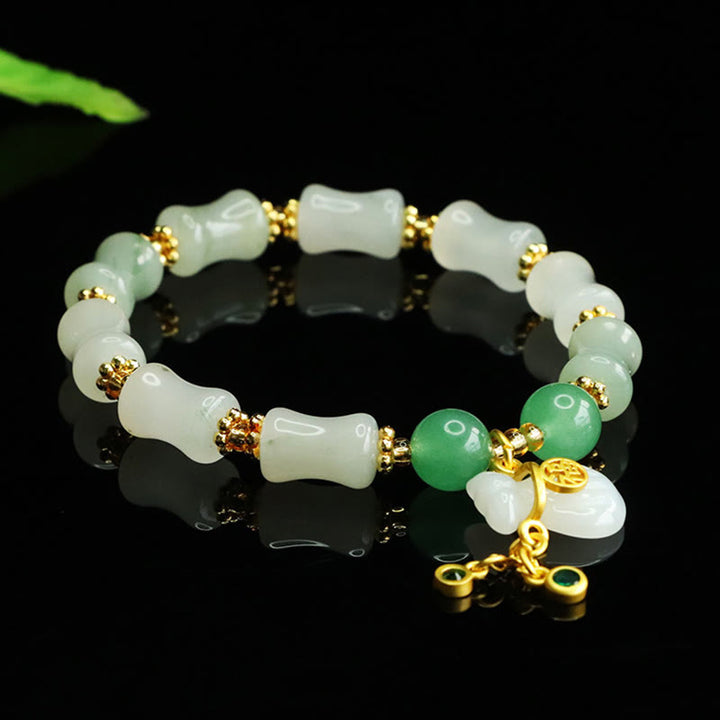 Pulsera de la prosperidad con diseño de bolsa de dinero y jade Tianshan natural de Buddha Stones - image 5
