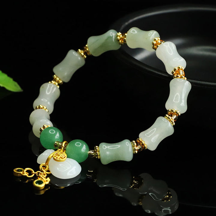Pulsera de la prosperidad con diseño de bolsa de dinero y jade Tianshan natural de Buddha Stones - image 3