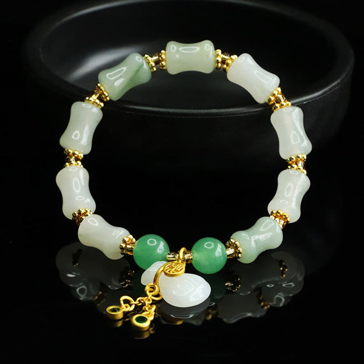 Pulsera de la prosperidad con diseño de bolsa de dinero y jade Tianshan natural de Buddha Stones - image 2