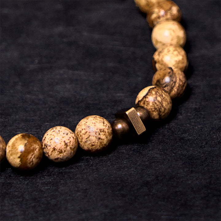 Pulsera de cobre de la suerte con diseño desgastado de Buddha Stones