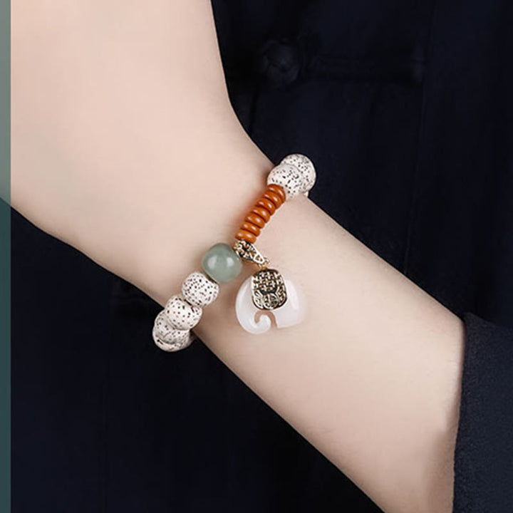 Pulsera de paz interior con Buddha Stones pulidas a mano, estrella, luna, semilla de Bodhi y patrón de elefante - image 10