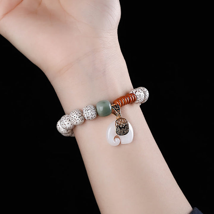Pulsera de paz interior con Buddha Stones pulidas a mano, estrella, luna, semilla de Bodhi y patrón de elefante - image 5