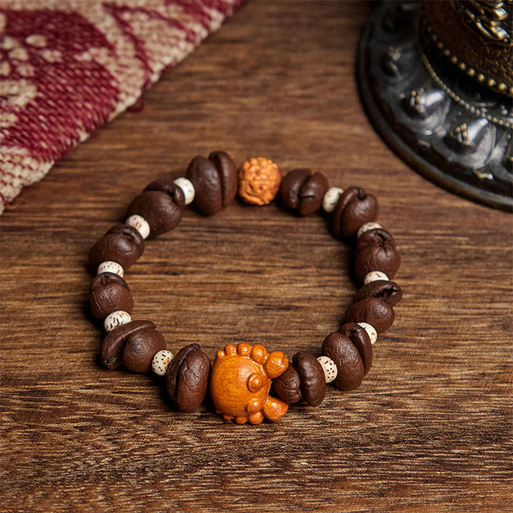 Pulsera de madera de wengué hecha a mano con Buddha Stones, cangrejo, monedas de cobre, granos de café - Grano de café (circunferencia de la muñeca: 17,5 cm) - image 1