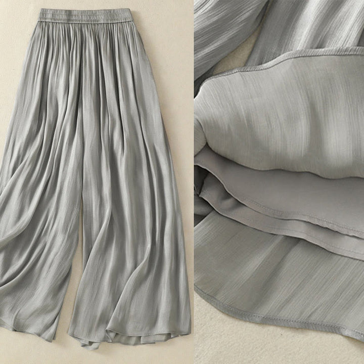 Pantalones de mujer de pierna ancha con bolsillos, diseño plisado en gris claro con estampado de Buddha Stones y cintura elástica. - image 4