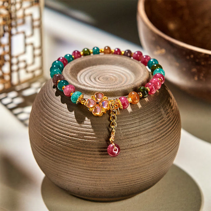 Pulsera de amor con flor de trébol de cuatro hojas y turmalina de Buddha Stones