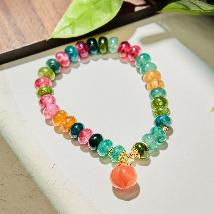 Pulsera positiva de melocotón con Buddha Stones