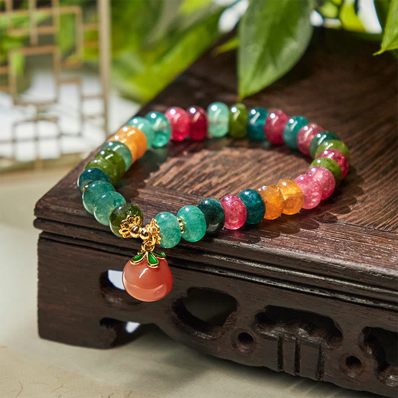 Pulsera positiva de melocotón con Buddha Stones