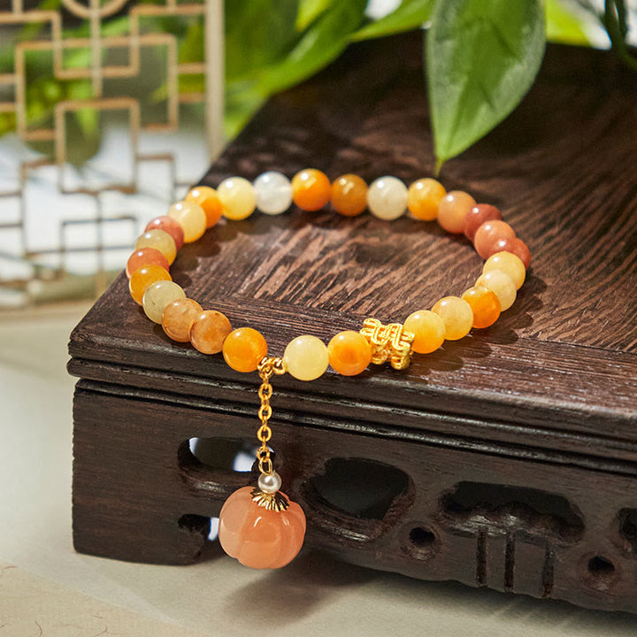 Pulsera de la riqueza con calabaza y anudado chino de jade y seda dorada con Buddha Stones