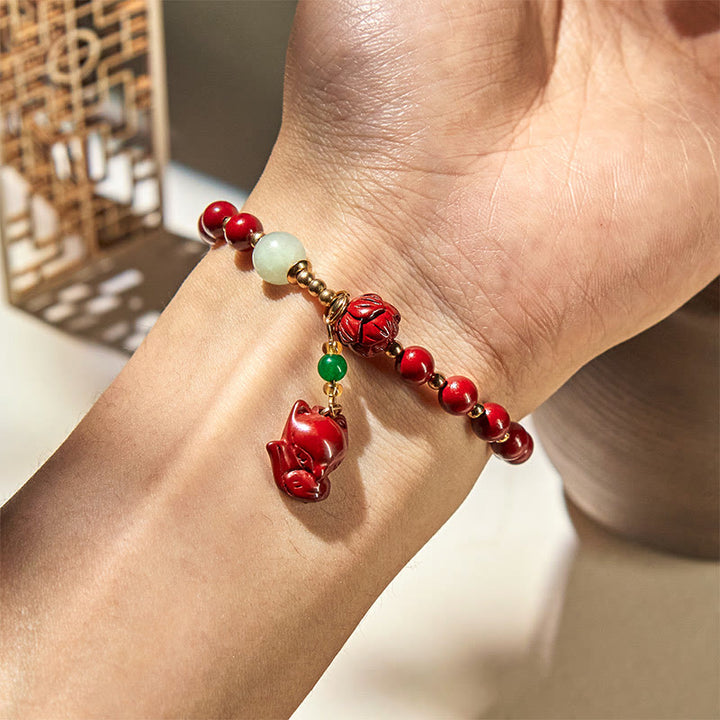 Pulsera con dije de zorro adorable de loto cinabrio y Buddha Stones