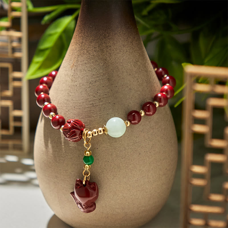 Pulsera con dije de zorro adorable de loto cinabrio y Buddha Stones