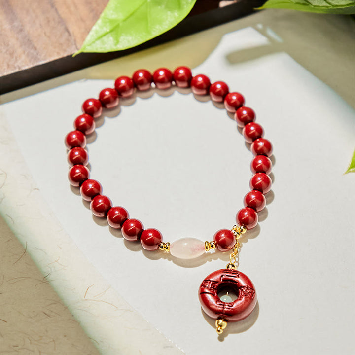 Pulsera con dije de paz y hebilla de cinabrio natural de Buddha Stones