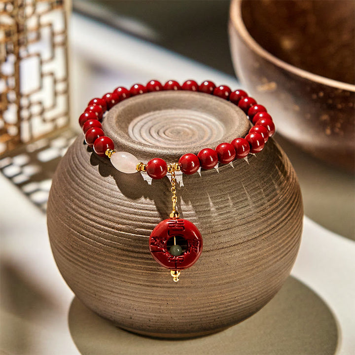 Pulsera con dije de paz y hebilla de cinabrio natural de Buddha Stones