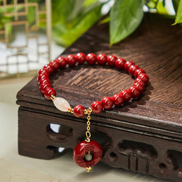 Pulsera con dije de paz y hebilla de cinabrio natural de Buddha Stones