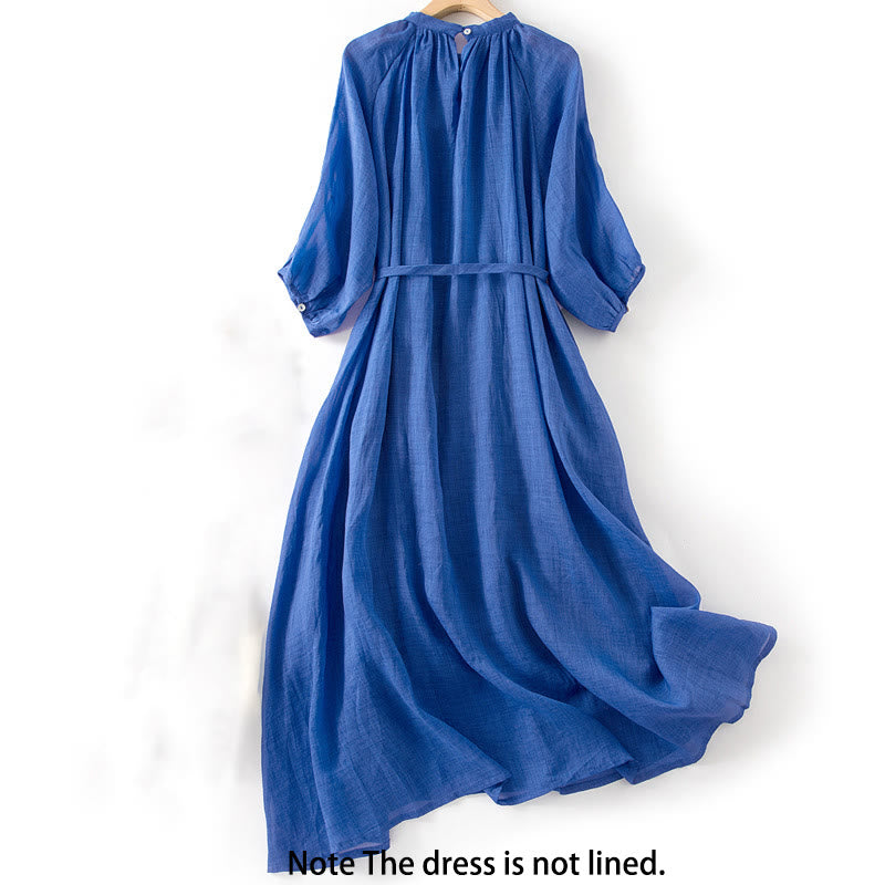 Vestido midi liso con mangas tres cuartos abullonadas y bolsillos, estampado Buddha Stones. - image 1