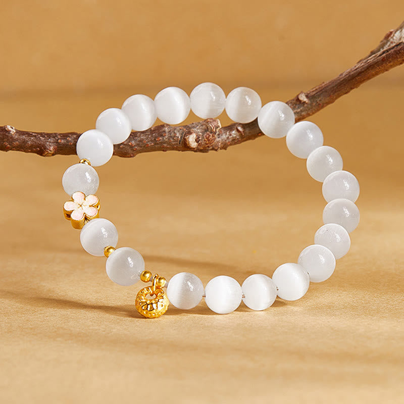 Pulsera de la suerte con ojo de gato blanco y flor de melocotón de plata de ley 925 con Buddha Stones - image 1