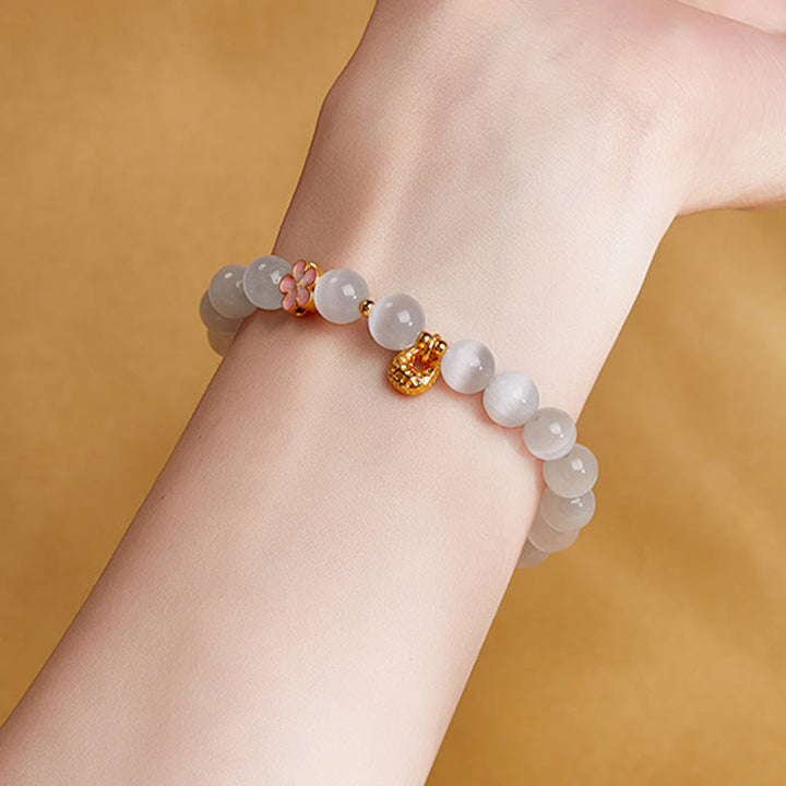 Pulsera de la suerte con ojo de gato blanco y flor de melocotón de plata de ley 925 con Buddha Stones - image 10