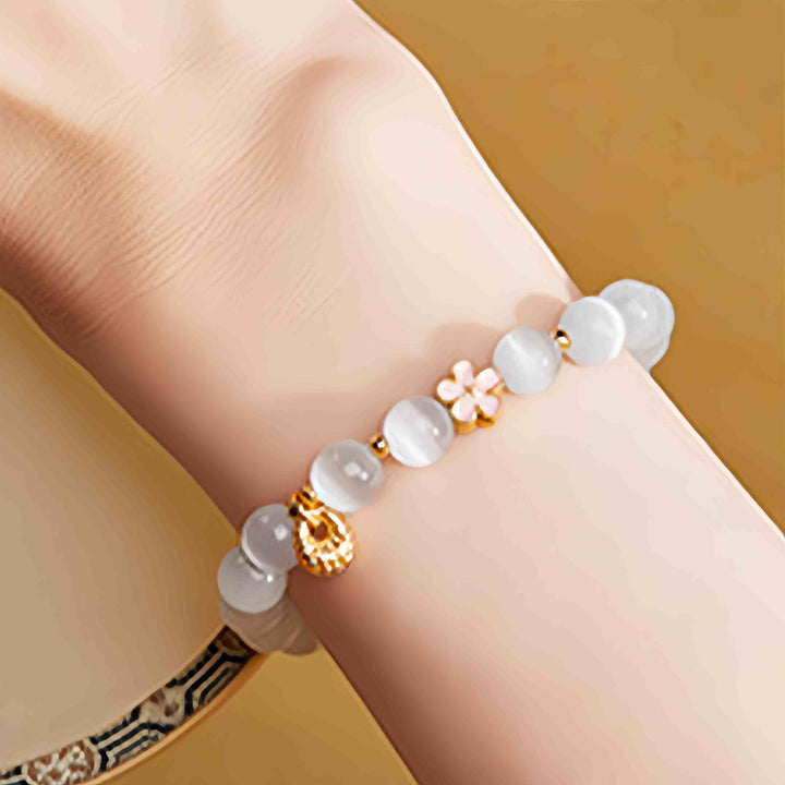 Pulsera de la suerte con ojo de gato blanco y flor de melocotón de plata de ley 925 con Buddha Stones - image 9