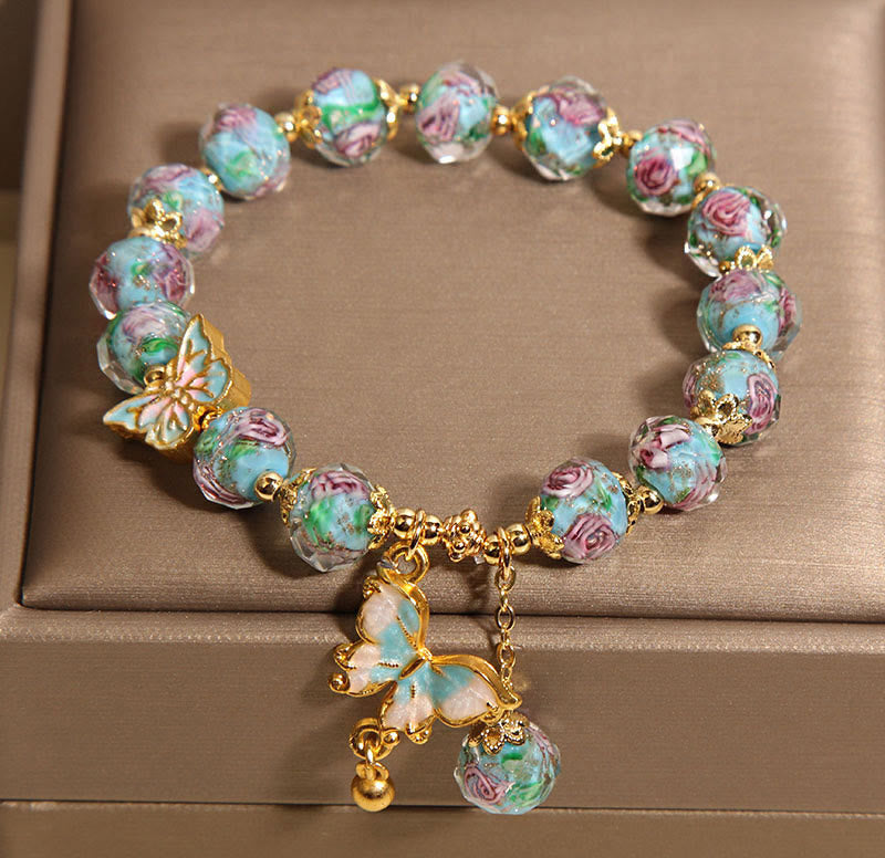 Pulsera Liuli con dije de mariposa y flor rosa de Buddha Stones - image 3