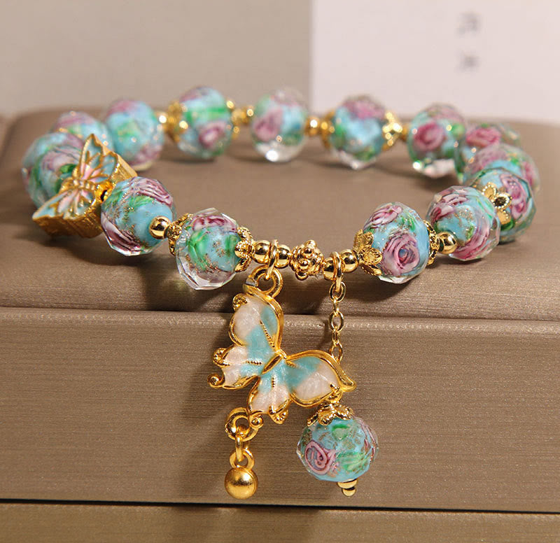 Pulsera Liuli con dije de mariposa y flor rosa de Buddha Stones - Liuli azul (circunferencia de la muñeca: 18 cm) - image 0