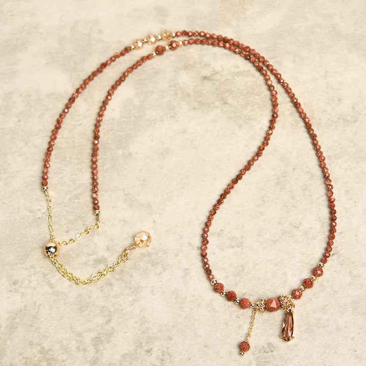 Pulsera multicapa positiva con cuentas de piedra dorada naturales de 2 mm de Buddha Stones