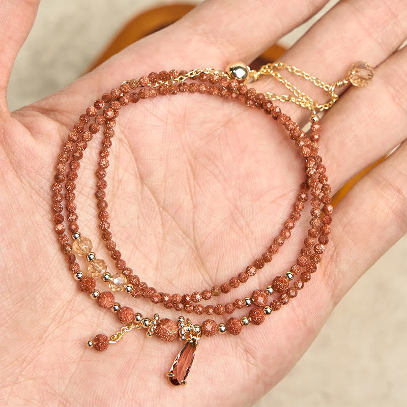 Pulsera multicapa positiva con cuentas de piedra dorada naturales de 2 mm de Buddha Stones