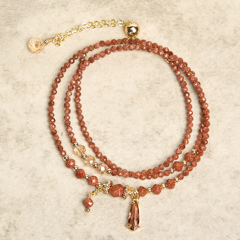 Pulsera multicapa positiva con cuentas de piedra dorada naturales de 2 mm de Buddha Stones
