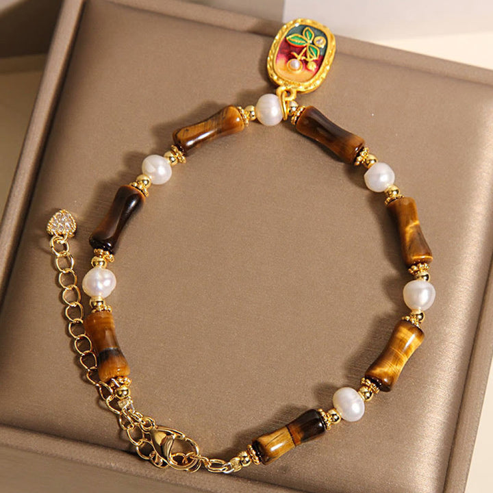 Pulsera de Buddha Stones con perla de ojo de tigre y bambú natural - image 5