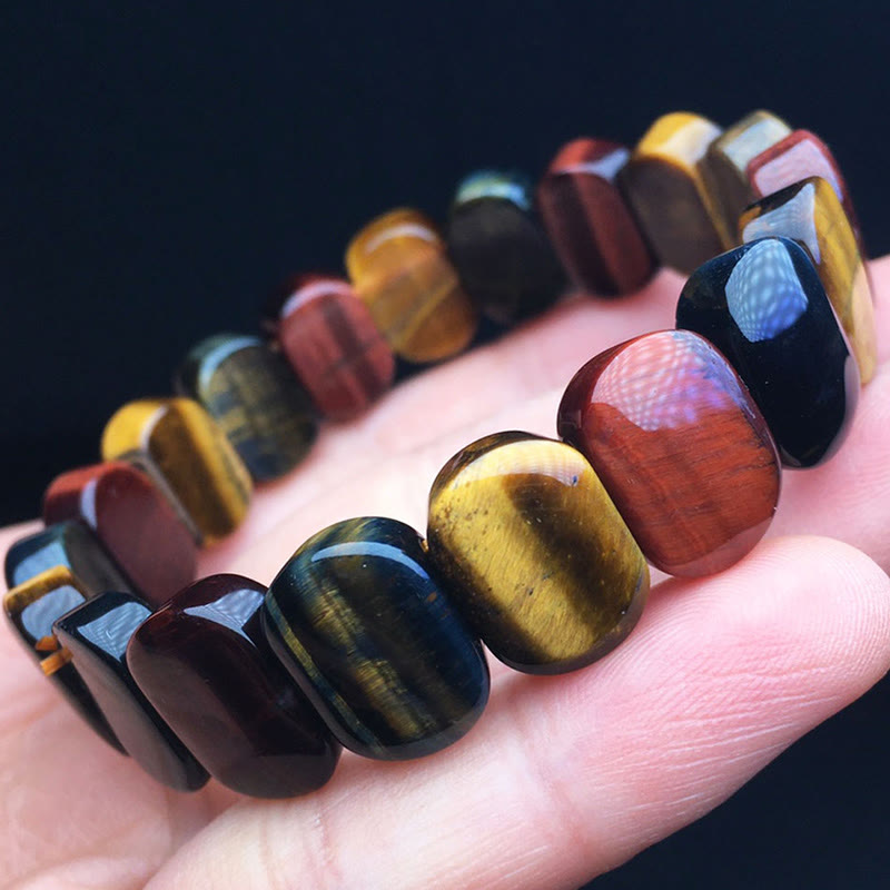 Pulsera de fuerza con cuentas ovaladas de ojo de tigre de colores naturales de Buddha Stones