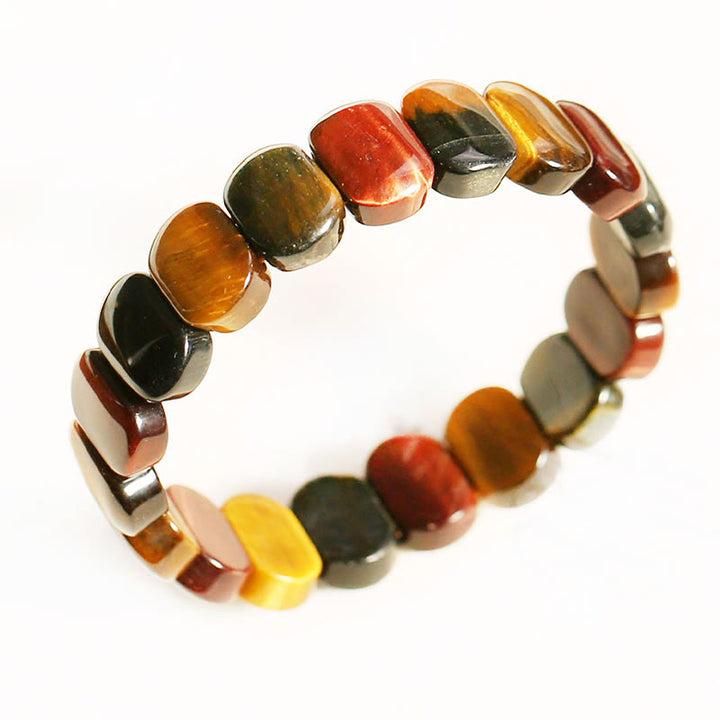 Pulsera de fuerza con cuentas ovaladas de ojo de tigre de colores naturales de Buddha Stones