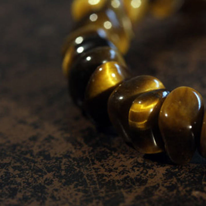 Pulsera de coraje con bloques irregulares de ojo de tigre y Buddha Stones