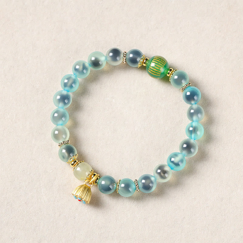 Pulsera curativa con vaina de loto dorado y ágata de caramelo natural de Buddha Stones - image 3