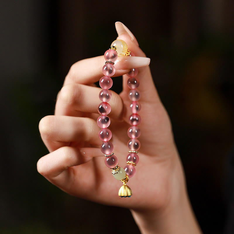 Pulsera curativa con vaina de loto dorado y ágata de caramelo natural de Buddha Stones - image 16