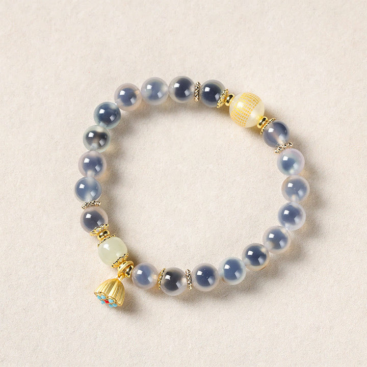 Pulsera curativa con vaina de loto dorado y ágata de caramelo natural de Buddha Stones - Ágata de caramelo blanca (circunferencia de la muñeca: 14-15 cm) - image 12