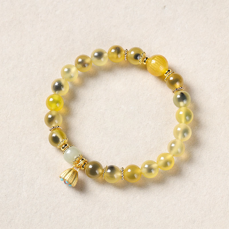 Pulsera curativa con vaina de loto dorado y ágata de caramelo natural de Buddha Stones - Ágata de caramelo amarilla (circunferencia de la muñeca: 14-15 cm) - image 9