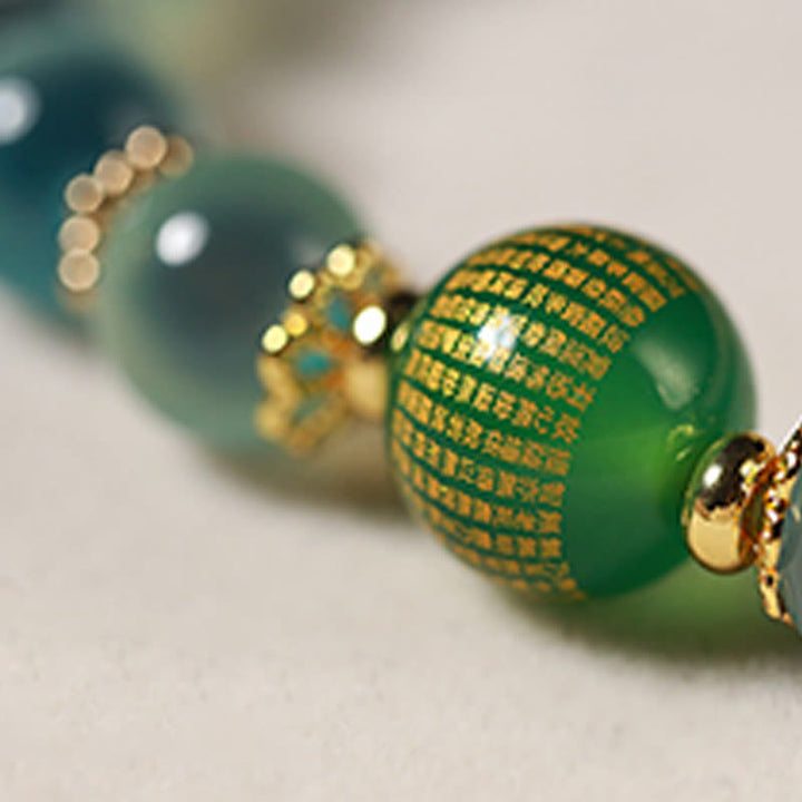 Pulsera curativa con vaina de loto dorado y ágata de caramelo natural de Buddha Stones - image 6