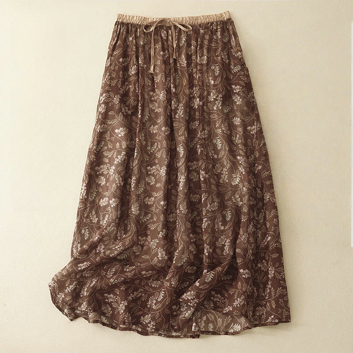 Falda de mujer con estampado floral de Buddha Stones , corte en A, cintura elástica y bolsillos. - Marrón silla de montar - US8-10，UK/AU12-14，EU40-42 (2XL) - image 0